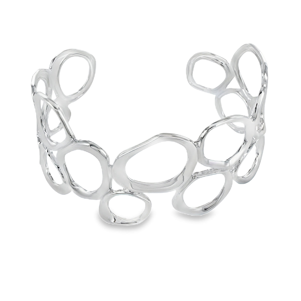 A sterling silver cuff bracelet, with irregular ringlet shapes adjoined with a high shine finish.
