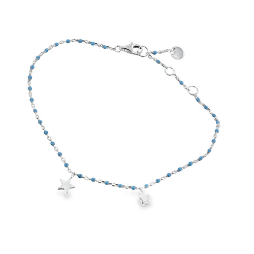 A sterling silver chain bracelet with baby blue enamel beads interspersed all along the chain. Two solid star charms hang off the chain at the front.