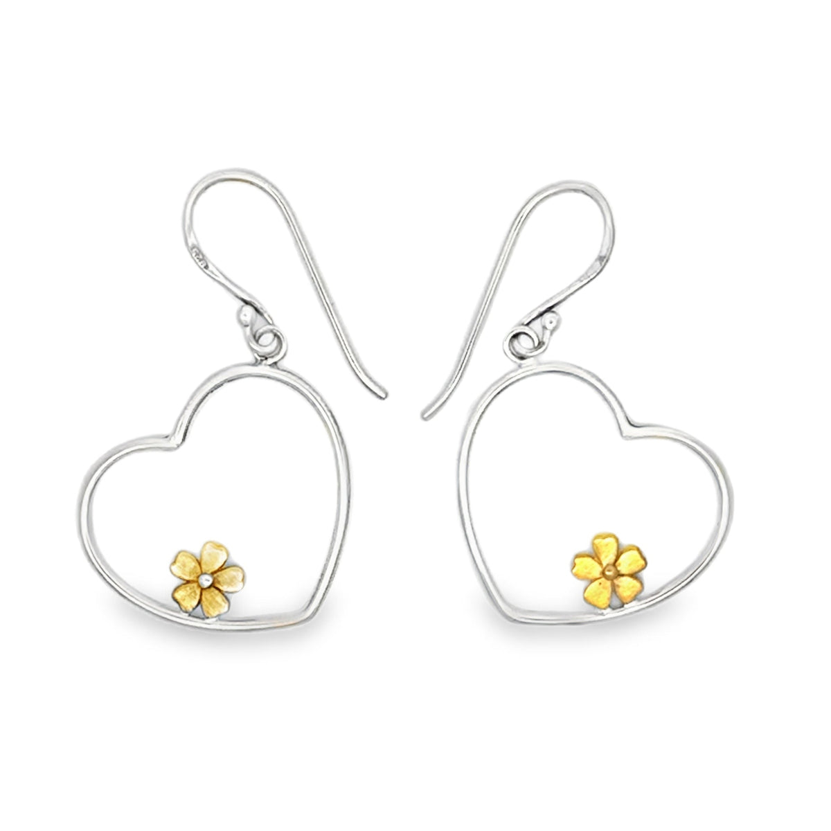A Sterling Silver Heart silhouette, hanging on a silver hook with an 18ct gold plated flower sat on the edge of the inside of the heart.