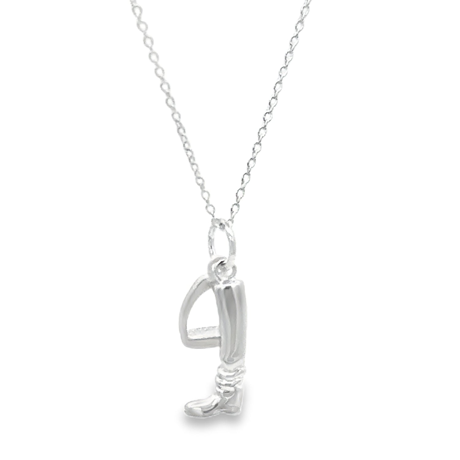 A sterling silver boot charm, hanging next to a matt silver stirrup charm and hung on a silver adjustable chain.