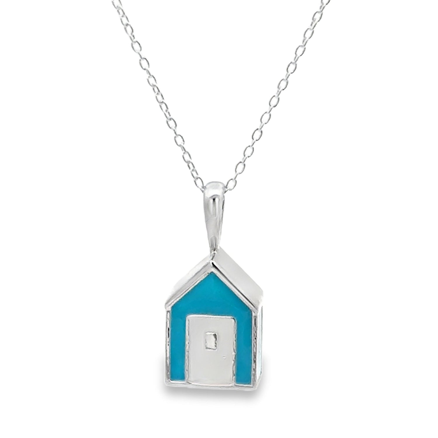Beach hut pendant in sterling silver with blue enamel finish. Hanging on an adjustable silver chain.