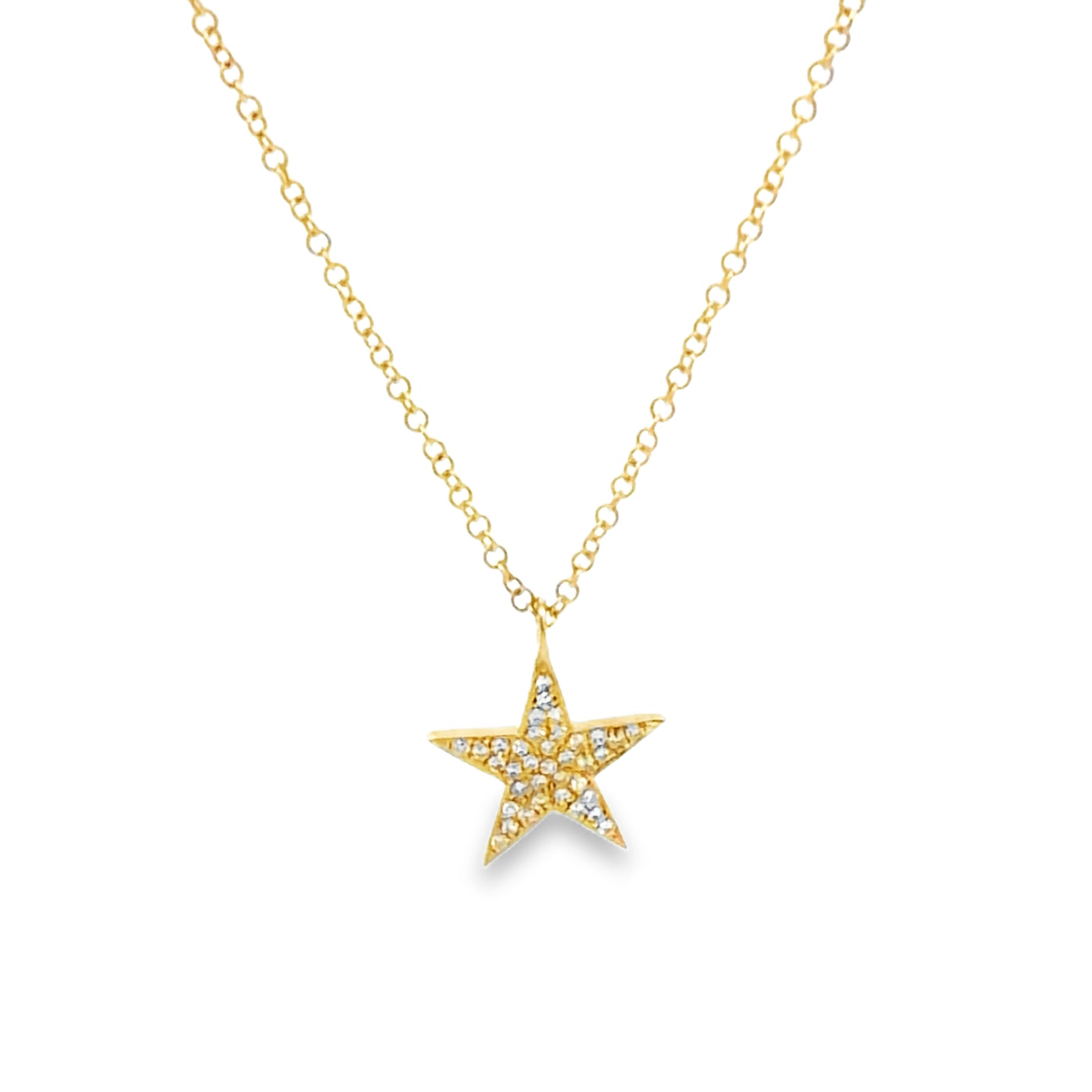 A gold star pendant necklace adorned with small clear diamonds suspended from a delicate gold chain against a solid white background.