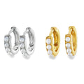 Two pairs of huggie hoop earrings on a white background, one in sterling silver and one with 18ct gold plating. Each hoop has white pearls set along the front of the hoop.