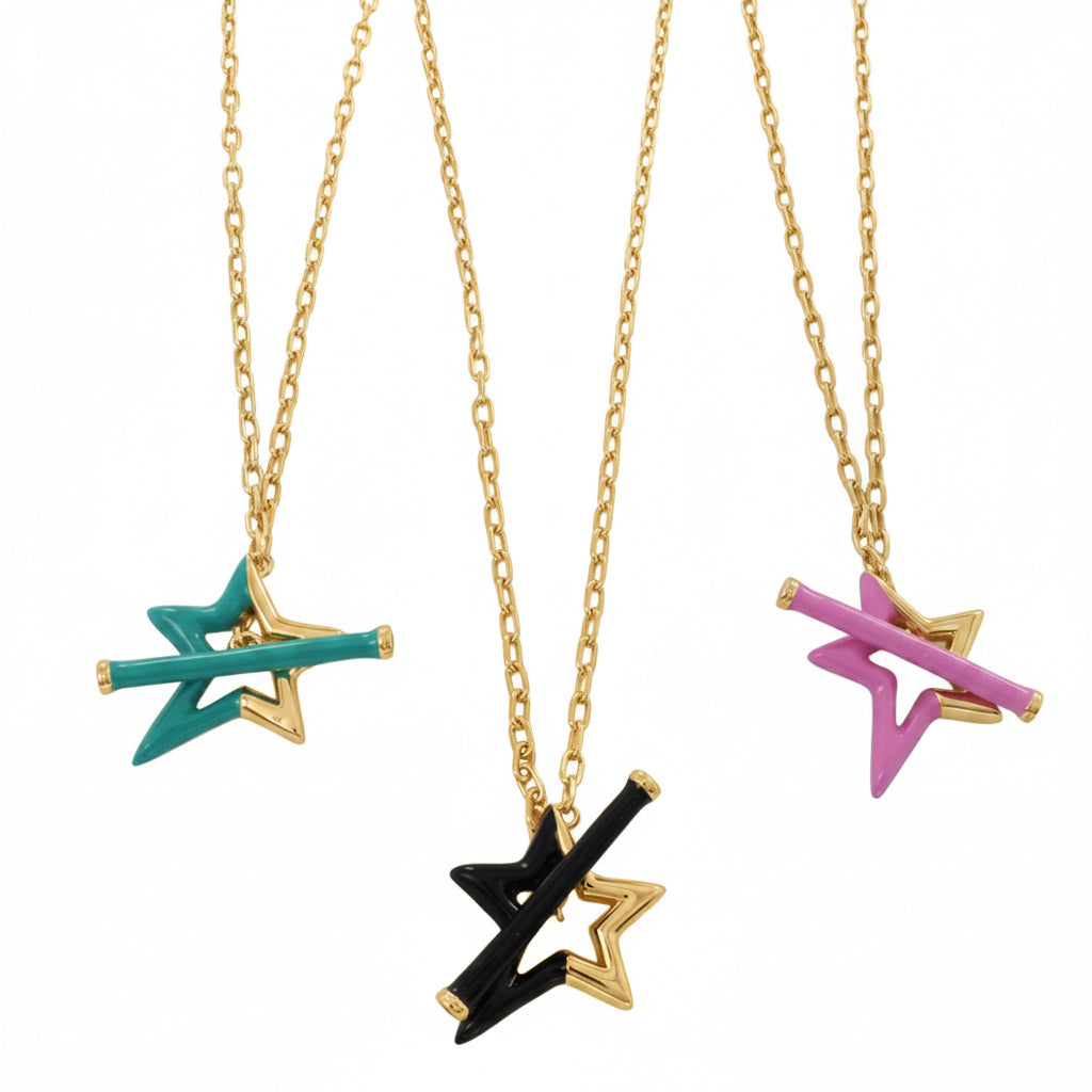 Three sterling silver star gold plated star necklaces hanging on gold chains. Each necklace has a star as the central feature, half coated in coloured enamel. Choose from turquoise, black or pink. The stars have matching enamel T bars through the centre as the clasp.