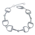 A chunky sterling silver bracelet featuring equestrian-inspired snaffle bit designs all the way around and finished with a lobster clasp and extender chain.