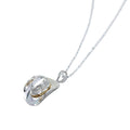 Sterling Silver Cowboy Hat Pendant with a gold plated rim, hanging on a silver adjustable chain.