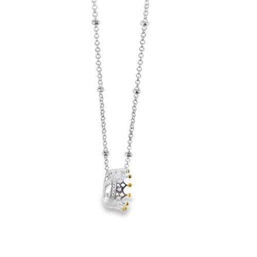 Sterling Silver Crown Pendant with gold plated detail on the crown spikes, hanging on a silver beaded chain.