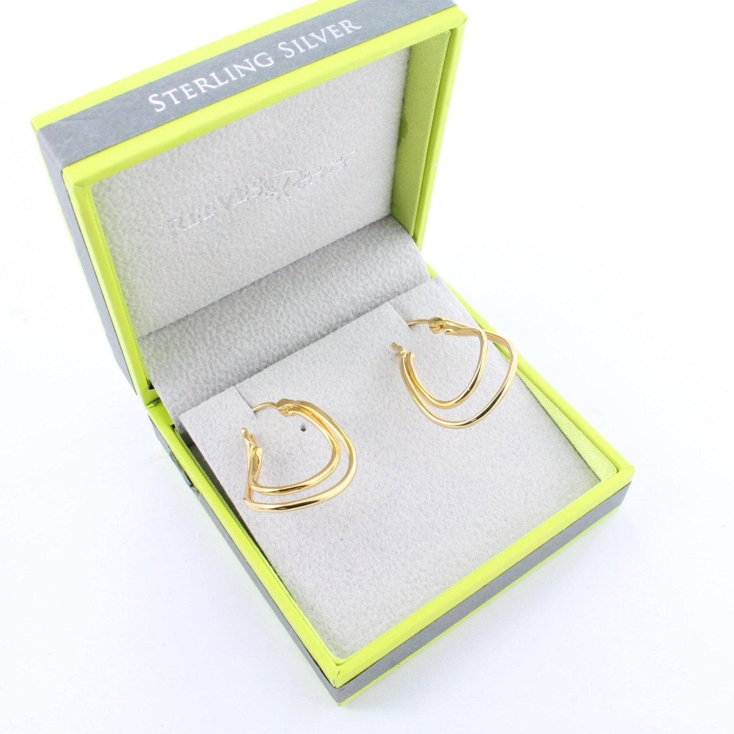 Gold plated double hoop earrings, shown in a Reeves & Reeves grey and green branded gift box.