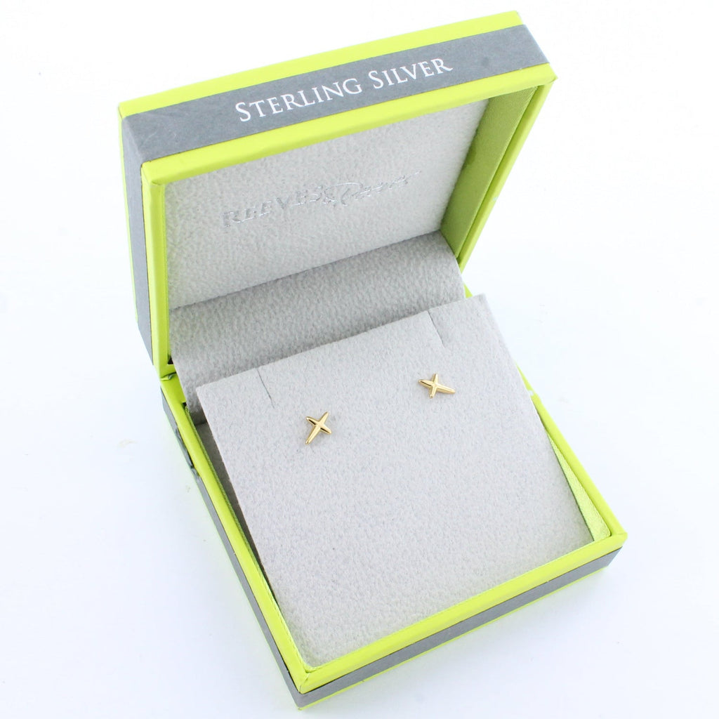 Gold 'X' earrings in a green and grey Reeves & Reeves branded gift box.