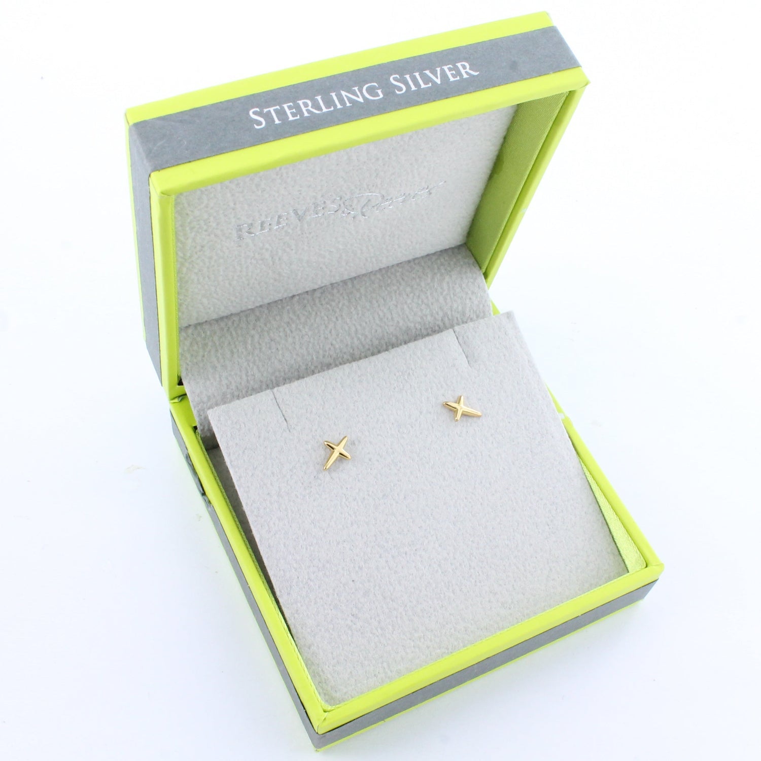 Gold 'X' earrings in a green and grey Reeves & Reeves branded gift box.