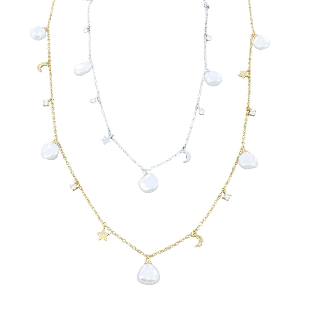 Two fine chain necklaces in sterling silver and gold plate. Both necklaces have white freshwater pearl charms interspersed with star and moon charms and cubic zirconia stones, all spaced evenly along the chain.