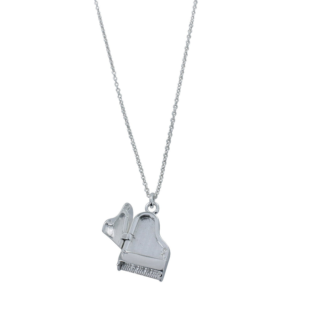 A sterling silver piano pendant where the lid opens, hung on a silver adjustable chain.