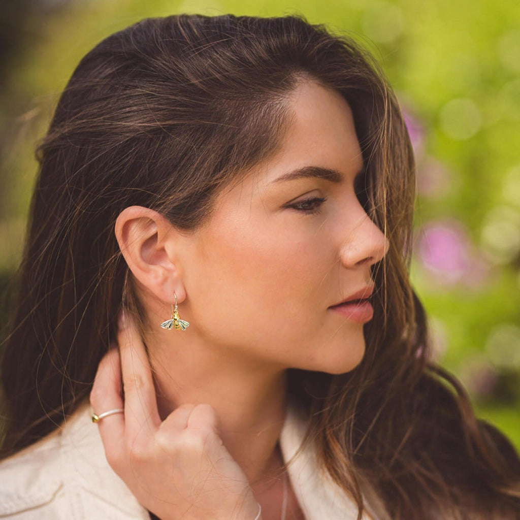 Sterling silver Queen Bee Earrings, on silver hooks with 18ct gold plating on its body and worn in a ladies ear.