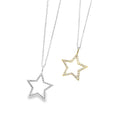 Two star-shaped silhouette pendants, filled with cubic zirconia and hanging on a silver adjustable chain.