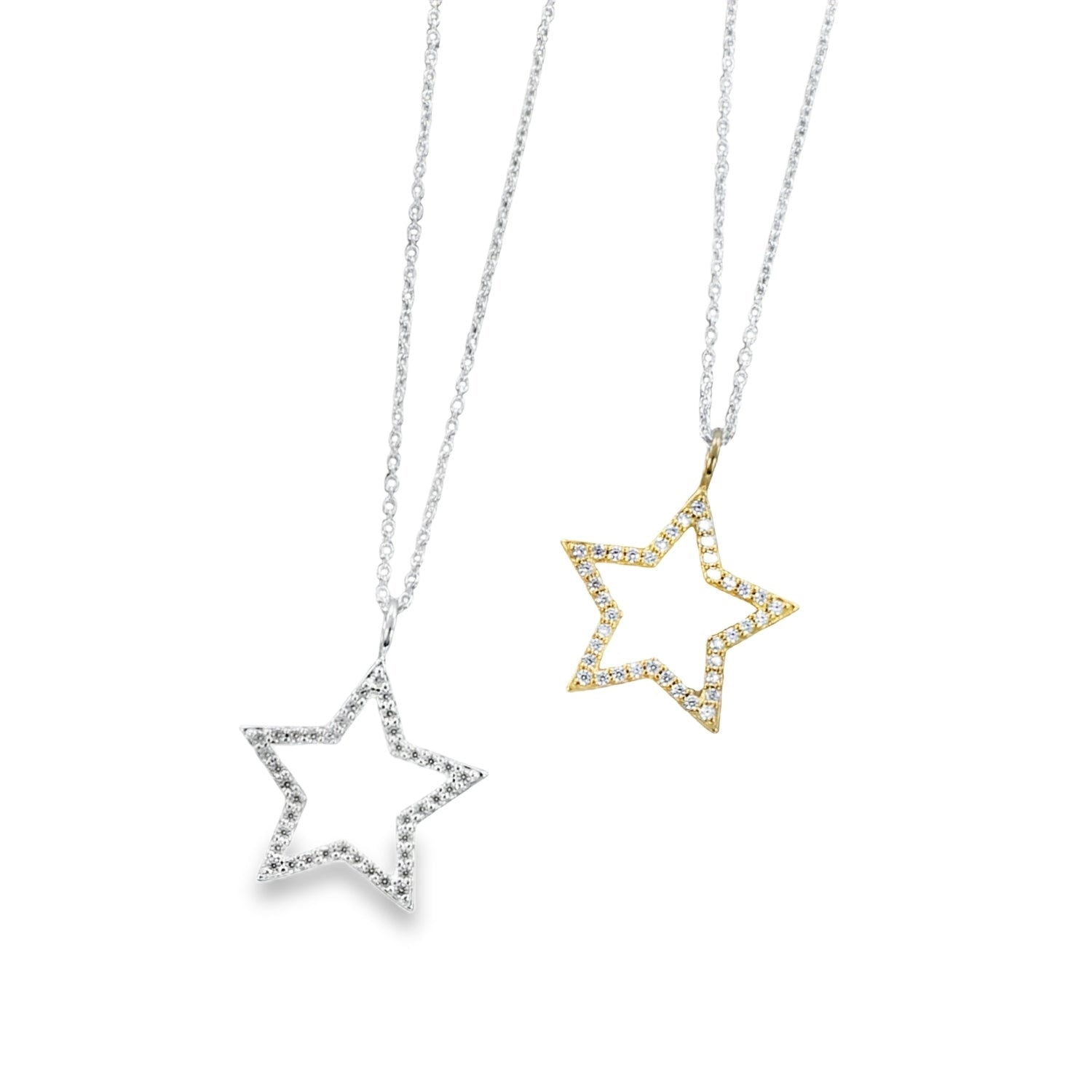 Two star-shaped silhouette pendants, filled with cubic zirconia and hanging on a silver adjustable chain.