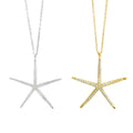 Two Sparkling Starfish Necklaces, one in silver and one in gold plate, filled with cubic zirconia stones and on adjustable fine chains.