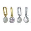 Two pairs of rectangular shaped hoops, one silver and one gold plated. Both hoops have button shaped white pearl charms hanging from the bottom.
