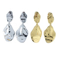 Two pairs of drop earrings, one silver and one gold plate. A convex circular shape sits on the stud style post, with a larger convex circular shape hanging below.
