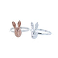 Two adjustable silver bands with Hares at the centre, one rose gold and one silver.