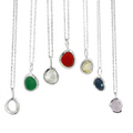 A collection of semi precious stones in varying birth months, set in silver bezels and hanging from silver adjustable chains.