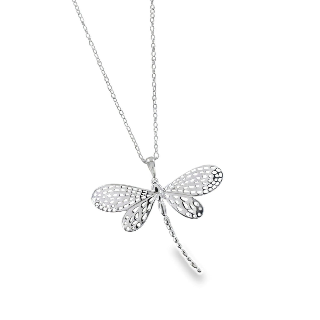 Silver dragonfly pendant necklace with cut outs in its wings, hanging on an adjustable silver chain.