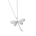 Silver dragonfly pendant necklace with cut outs in its wings, hanging on an adjustable silver chain.