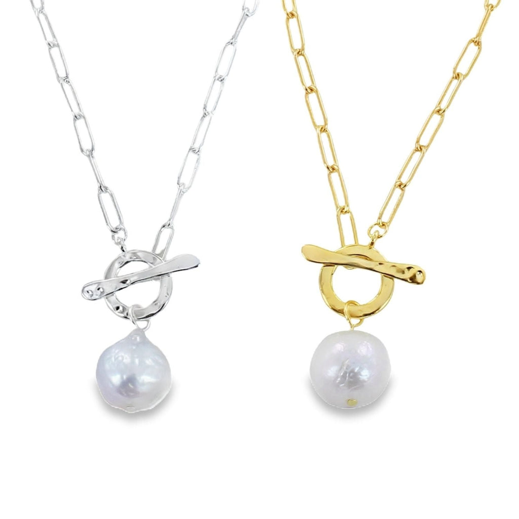 Two silver and gold plate paperclip chain necklaces with a circle central feature which doubles as the clasp with a T Bar going through it. A white freshwater pearl hangs from each necklace.
