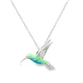 Blue and Green Sterling Silver with Blue and Green Enamel Hummingbird Pendant. Hanging on an adjustable silver chain.