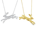 Two Hare pendants, one in Sterling silver and one in gold plate, hanging on adjustable chains.