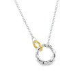 A sterling silver twisted circle with a smaller gold plated circle interlinking. These sit as the central feature on a silver adjustable chain.