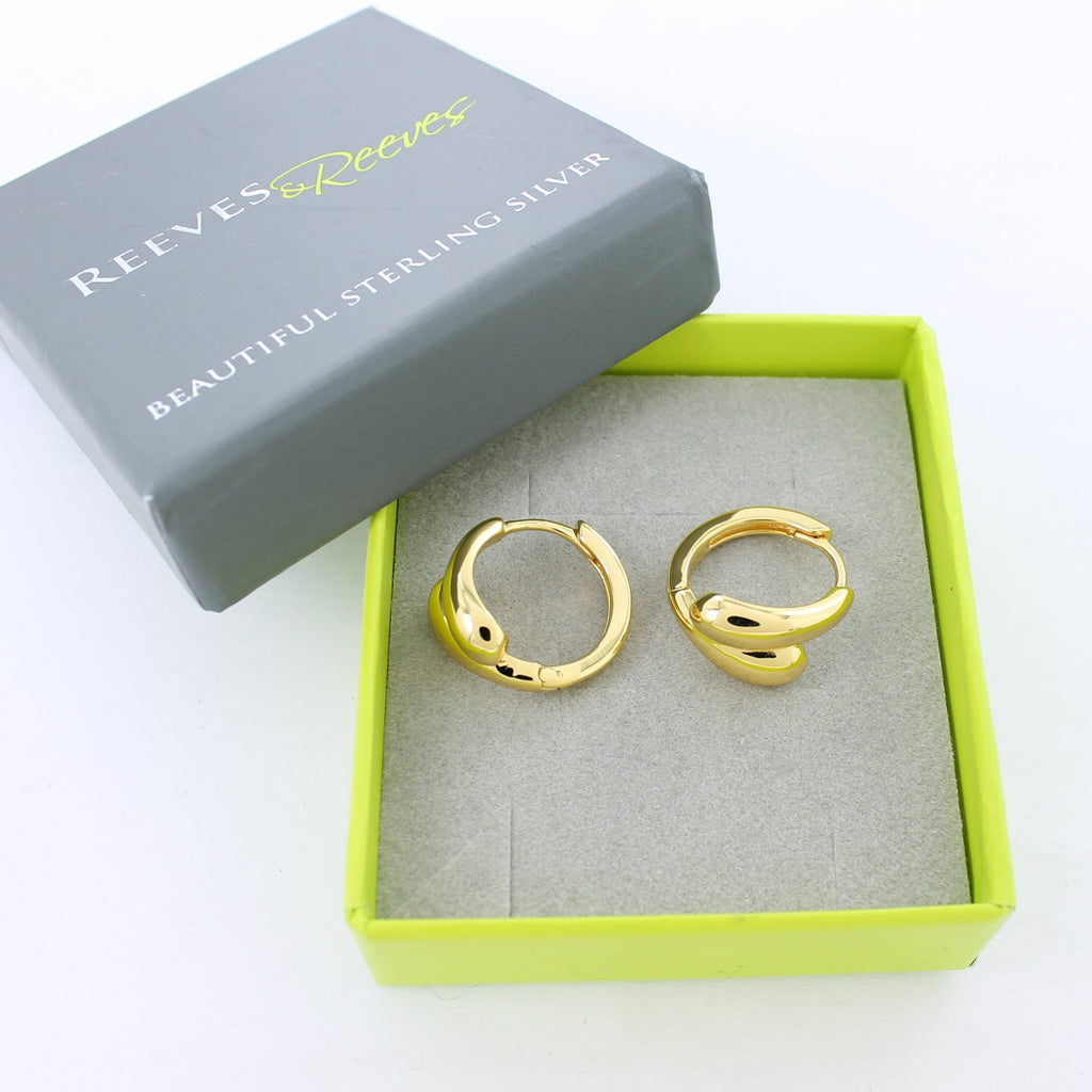 Gold plated hoop earrings with teardrop shapes that curve around to meet at the front of the hoop. Shown in a Reeves & Reeves grey and green branded gift box.