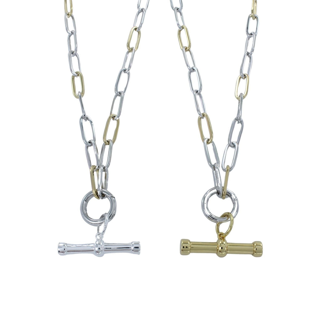 Two sterling silver paperclip style chains, with 18ct gold plating on every fourth link. The necklace is finished with a circular clasp and has a t bar hanging below in either silver or gold plate.