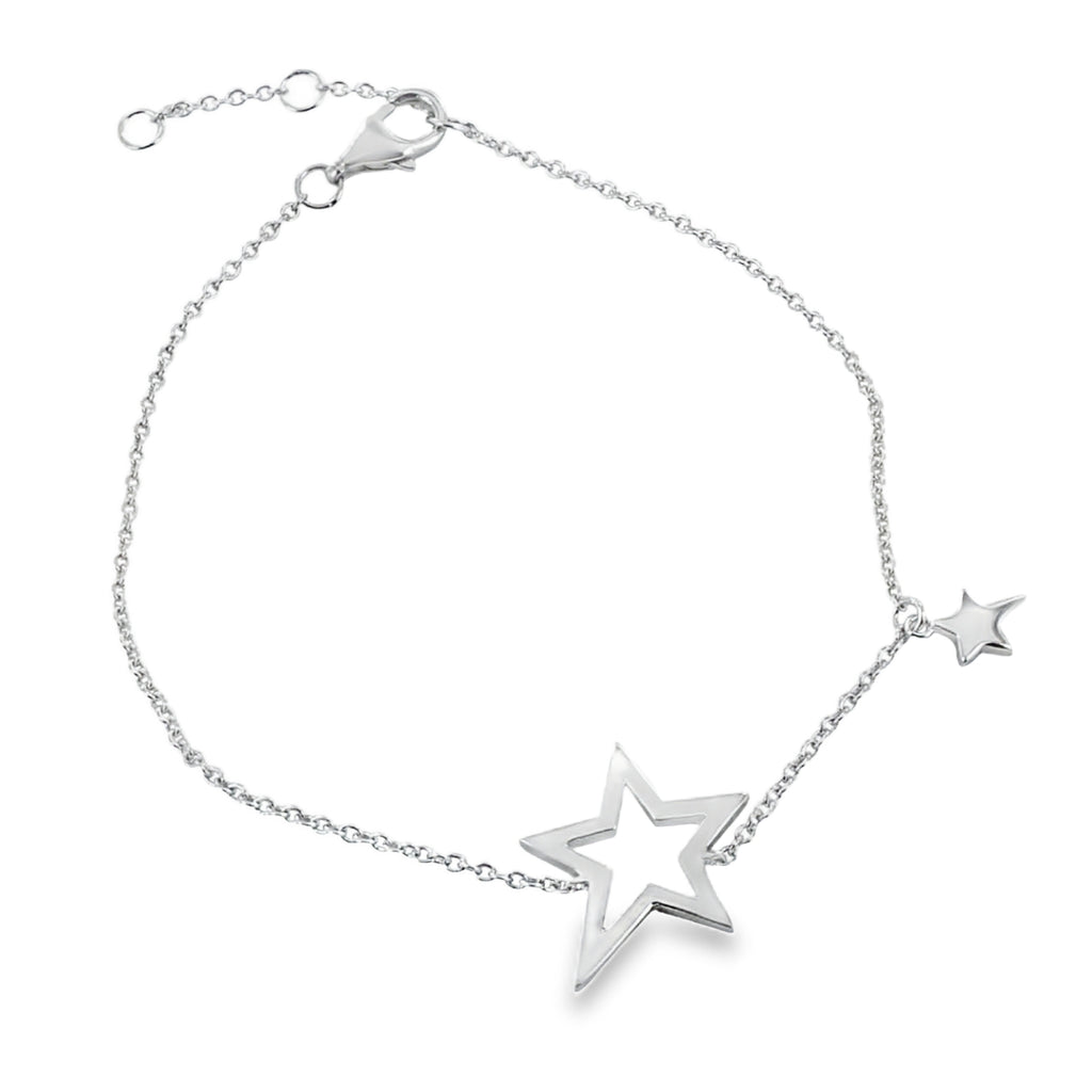 A sterling silver chain bracelet with a large star silhouette at the centre. Further along the chain is a smaller solid star charm hanging from the chain. The chain is finished with an adjuster and a lobster clasp.