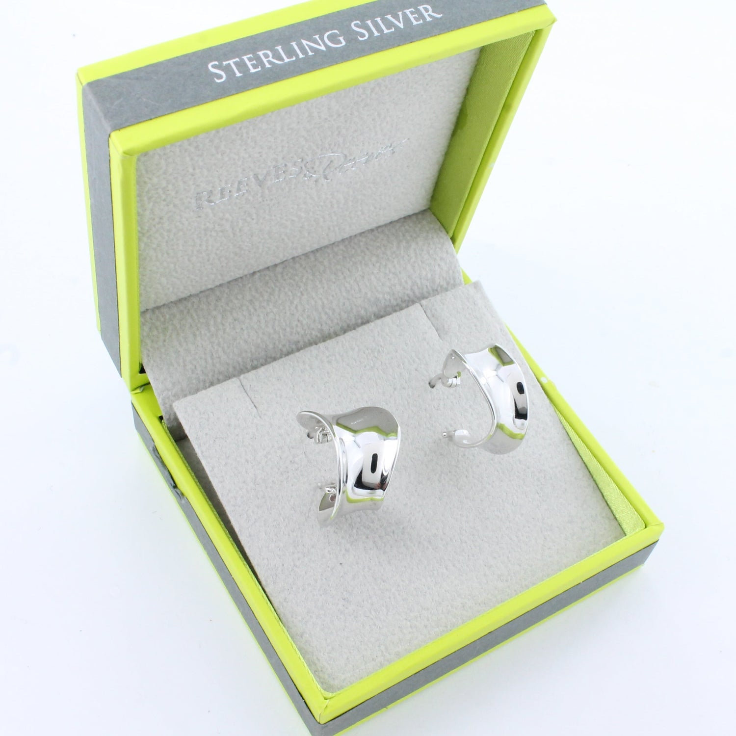 Silver wide hoops earrings shown in a Reeves & Reeves grey and green branded gift box.