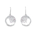 A pair of sterling silver drop earrings which feature a circular design and a cherry blossom design hanging from inside the circle. The design hangs from silver hooks.