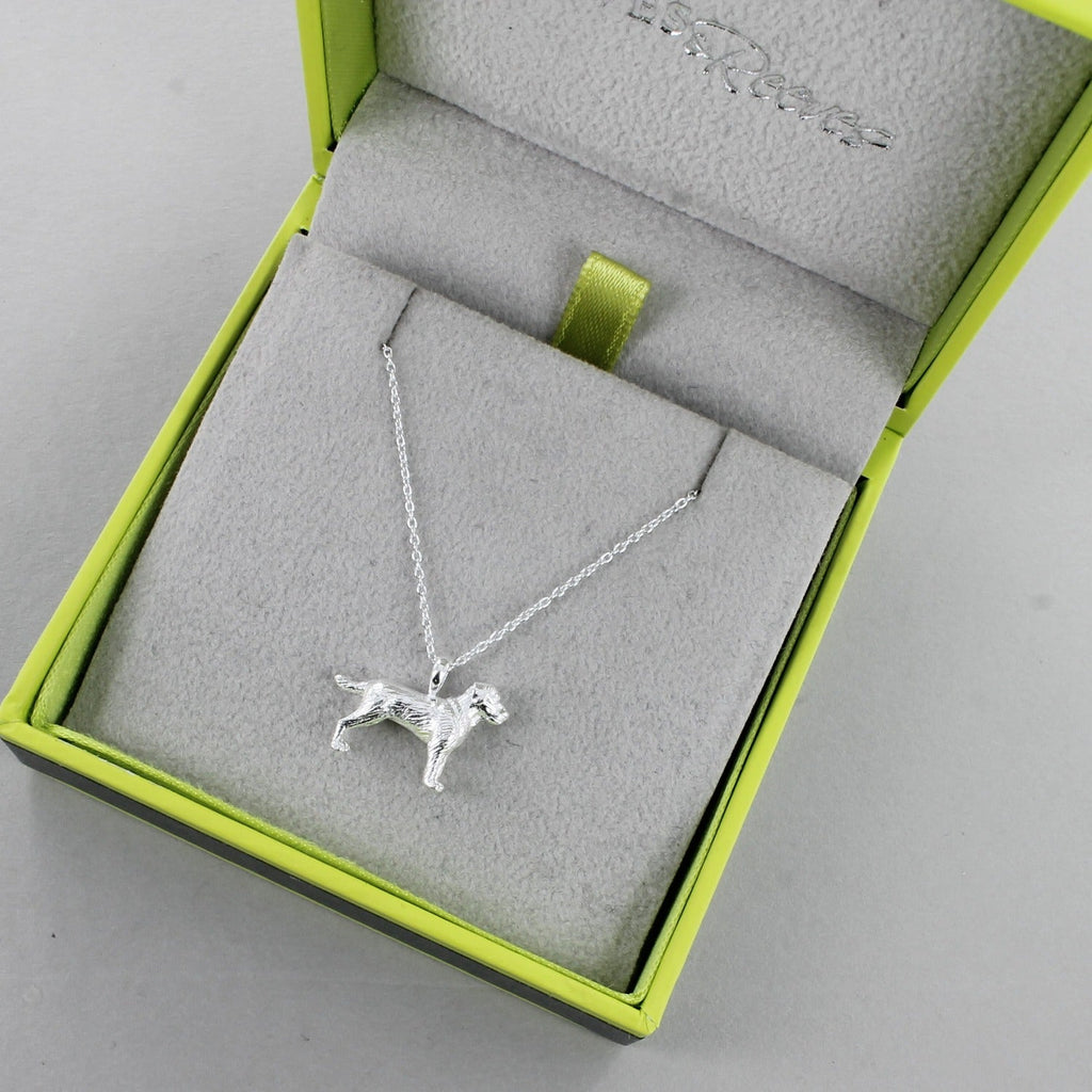 A Sterling Silver Labrador Dog Necklace, on a silver chain and shown in a Reeves & Reeves grey and green branded gift box.