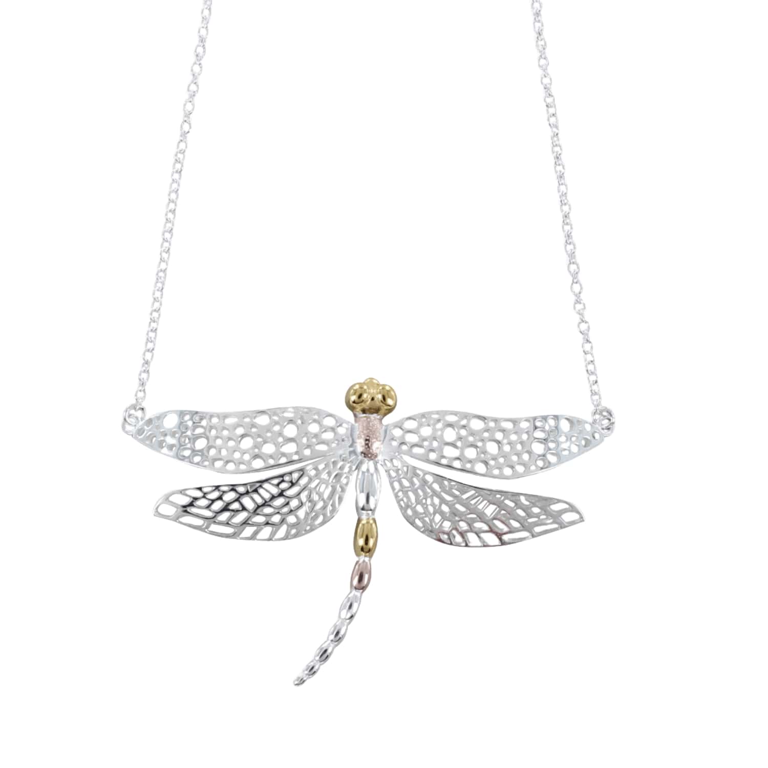 A Sterling Silver Dazzling Dragonfly Necklace, with cut out wings and 18ct yellow and rose gold plate detailing on its body. The dragonfly is hung centrally by the tips of its wings on a silver chain.