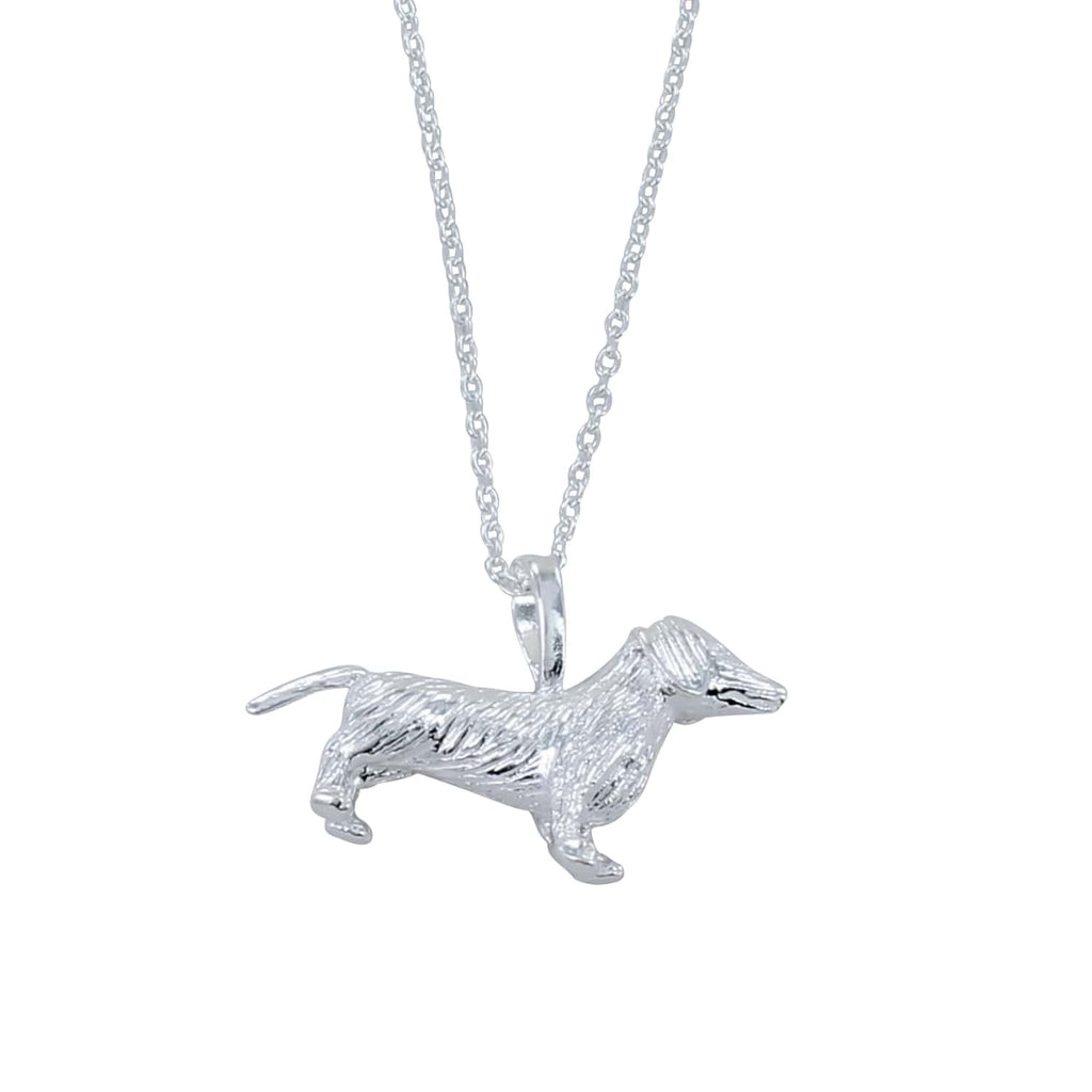 A sterling silver large dachshund pendant, hanging on a silver adjustable chain.