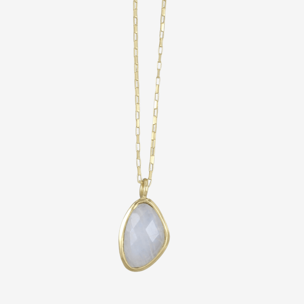 A moonstone stone necklace, set in gold plating and hanging on a gold plated box style chain.