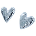 A pair of heart stud earrings in sterling silver with a hammered finish.