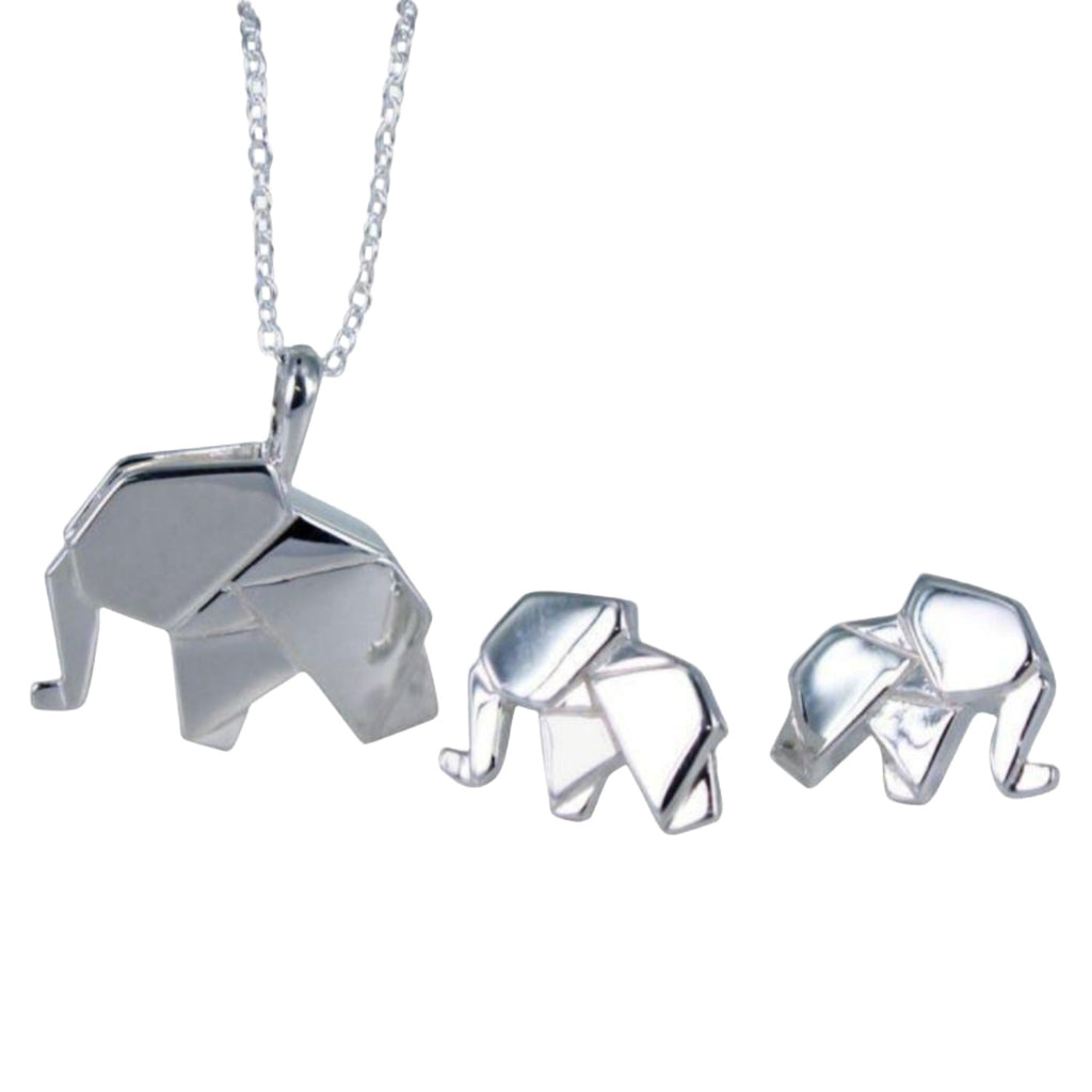 A pair of sterling silver elephant stud earrings in an origami style. Pictured next to the matching necklace.