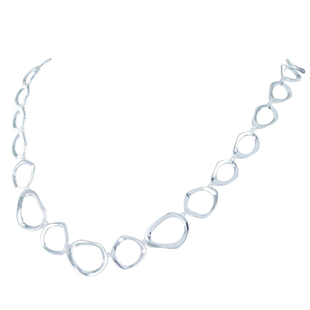 A sterling silver necklace comprised of 'ringlets', circles with undulated edges in a continuous line around the neck.
