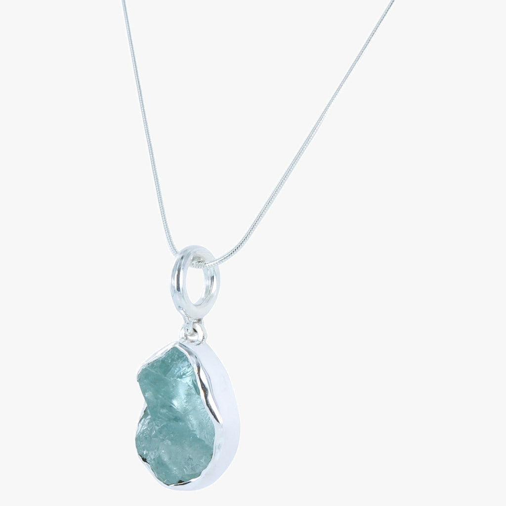 Semi precious aqua marine stone, set in sterling silver and hung on a silver rope style chain.