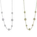 Two beaded chain necklaces, with varying size beads spread evenly along the chain. One in Silver and one in gold plate.