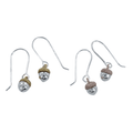 Two pairs of acorn drop earrings, one with 18ct yellow gold plating on the top, and one with rose gold plating. They both hang from silver hooks.