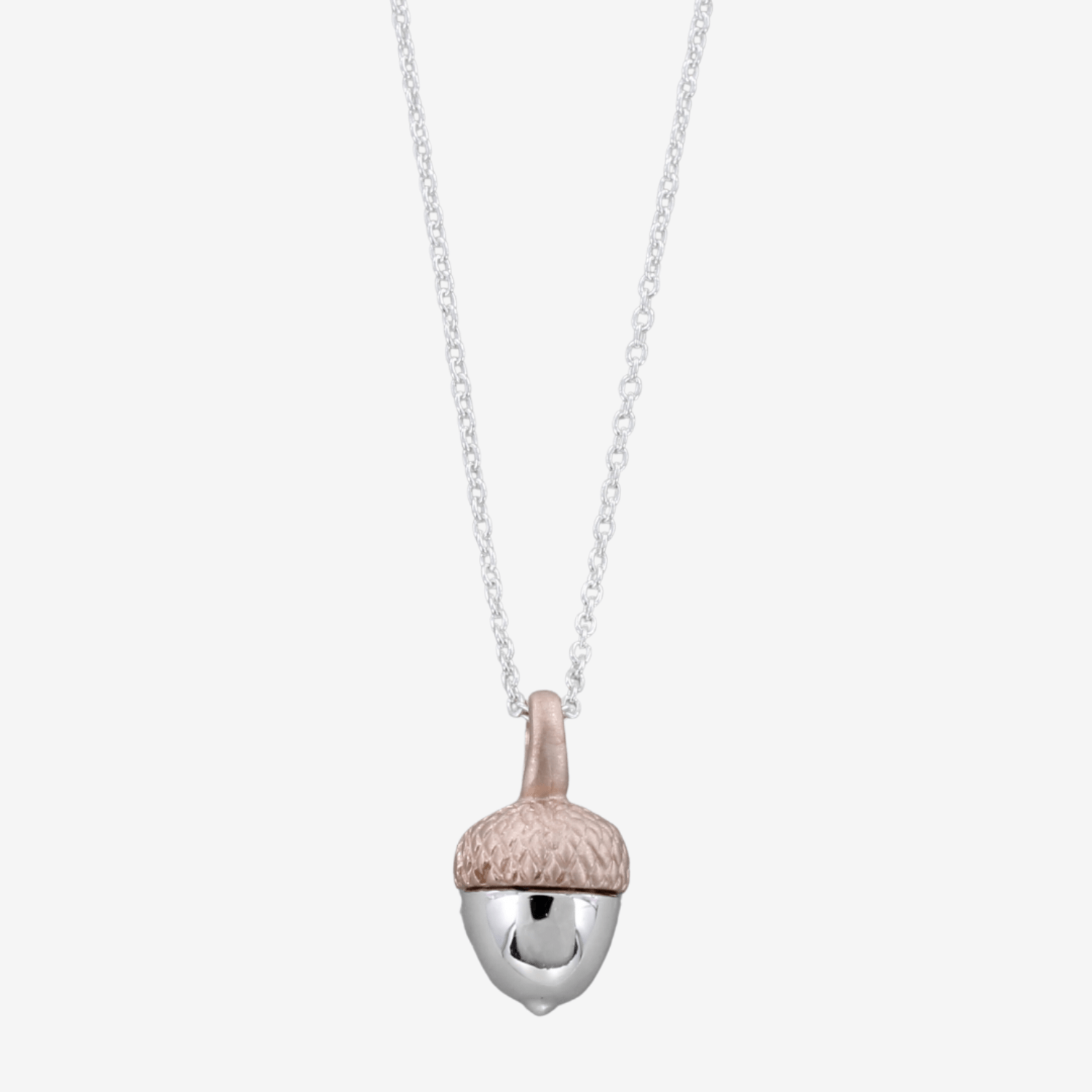Silver acorn pendant with an 18ct rose gold top, hanging on an adjustable silver chain.