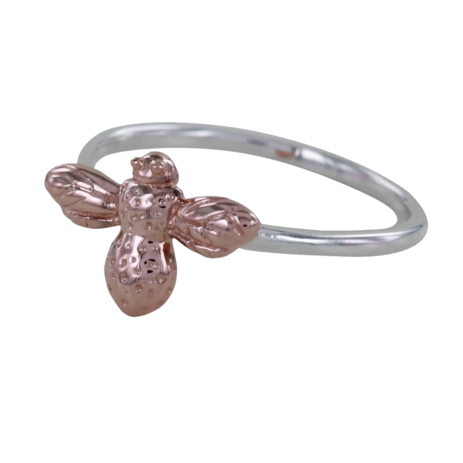 Silver banded ring with a rose gold bee as the central feature.