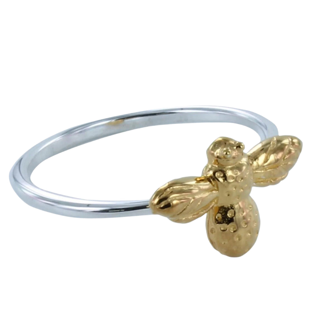 Silver banded adjustable ring with a gold plated bee charm at the centre.