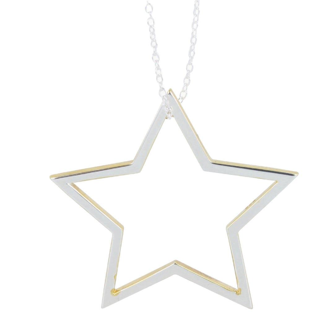 A Sterling Silver Star silhouette with gold plated edges and hung on a silver adjustable chain.