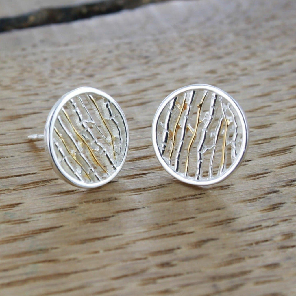 A pair of sterling silver Silver Birch stud earrings, with 18ct gold plate detail.